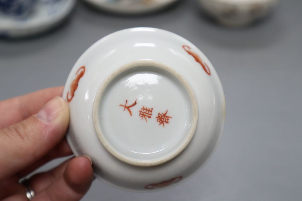 Three Chinese saucers and two teacups and a tea bowl, largest diameter 12.5cm